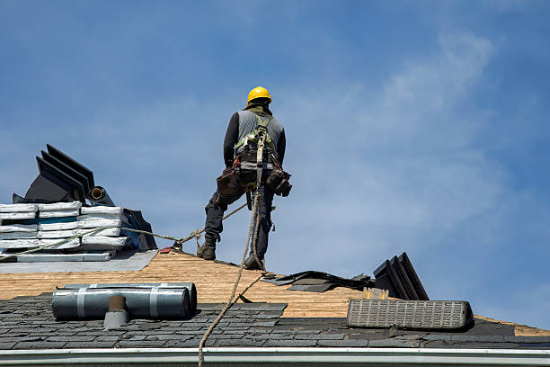 Professional Roofing technician working in New Sharon, IA
